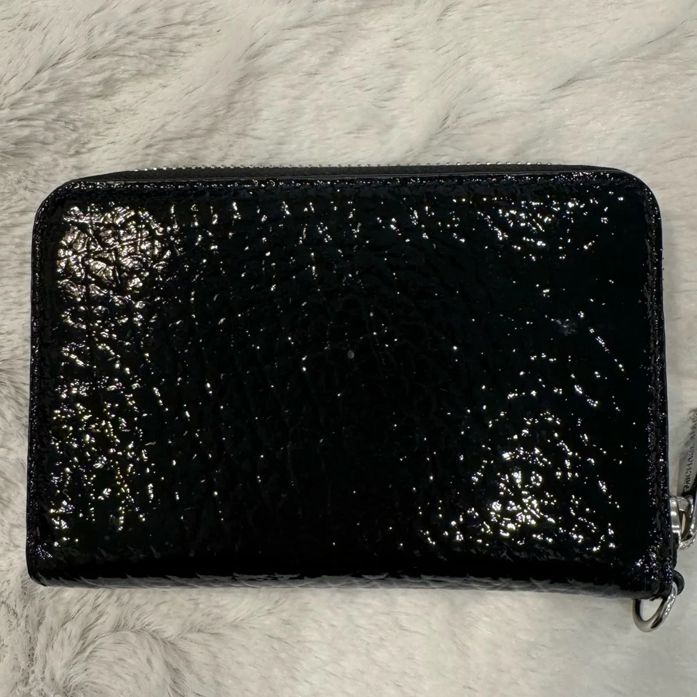 Michael Kors Snakeskin Wristlet in amazing condition!‎